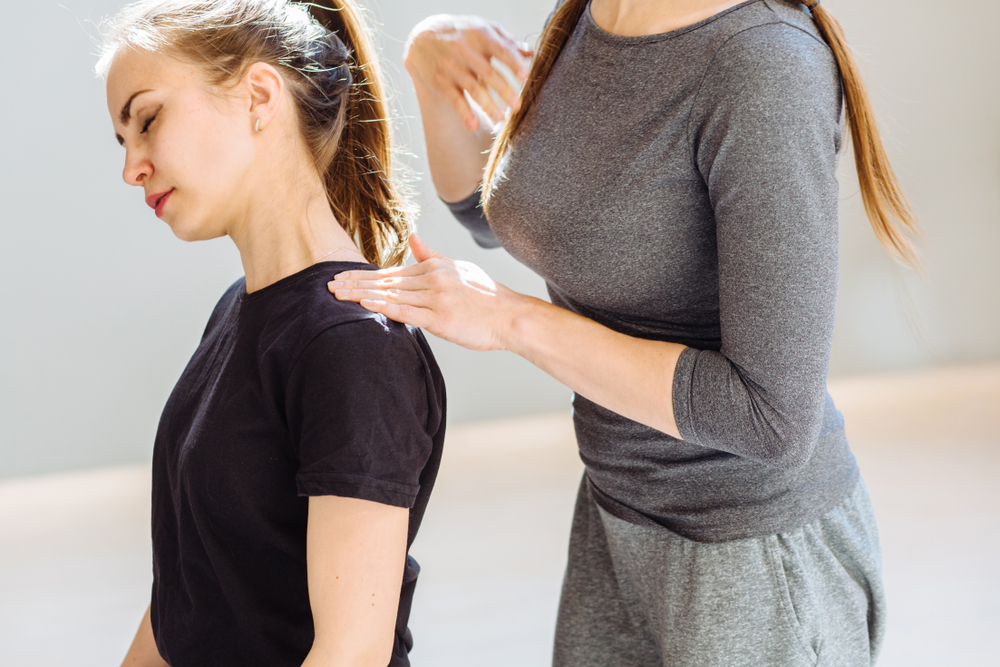 A close-up of a shoulder assessment highlighting common accident-related strain and the importance of chiropractic recovery care - boca raton auto accident chiropractor